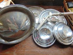 lot 3697 image: Hubcaps and Pump Handle