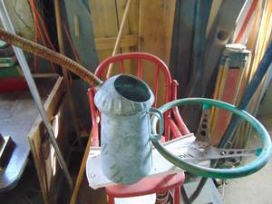 lot 3699 image: Galvanized Oil Can - Vintage Steering Wheel