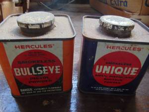 lot 3703 image: Pair of Metal Bullseye Cans