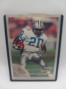 lot 11 image: Fleer 1996 Barry Sanders Running Back Football Card #47