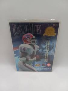 lot 19 image: Running Mates Trading Card Derrick Holmes, Jim Kelly RM23