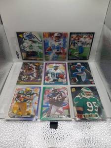 lot 75 image: Lot of 9 NFL Football Trading Cards Slaughter Fryah Woodside White Flores