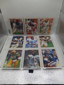 lot 82 image: Lot of 9 Fleer NFL Football Trading Cards 1990s