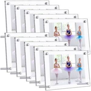 lot 958 image: 10 Clear Acrylic Picture Frames - Double Sided, Freestanding Floating Frames for Bedroom, Living Room, Home Office - 6 x 4 Inch - Retail $21,485