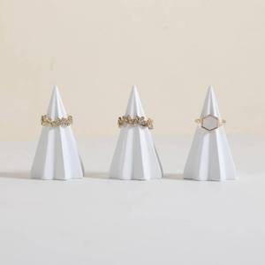 lot 2030 image: PHOTO FOR REFERENCE GemeShou 4pcs White Ring Cone Display Stand for Selling, Gypsum Jewelry Ring display holder, 3D Gypsum Jewelry ring cone holder for Home Decor��Gypsum slim cone with stripe-4pcs�� - Retail $13