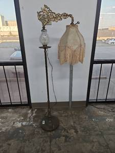 lot 1011 image: Floor Lamp with Ornate Brass Arm and Fringed Fabric Shade
