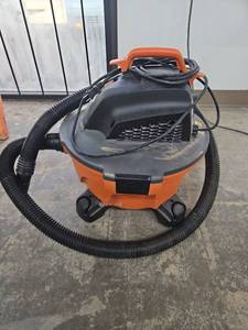 lot 1062 image: RIDGID Wet Dry Vacuum with Hose and Accessories