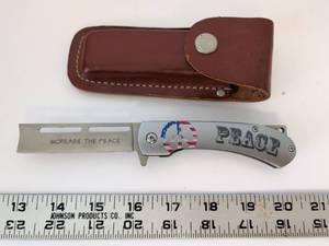 lot 2055 image: Peace Folding Pocket Knife Increase The Peace with Leather Sheath
