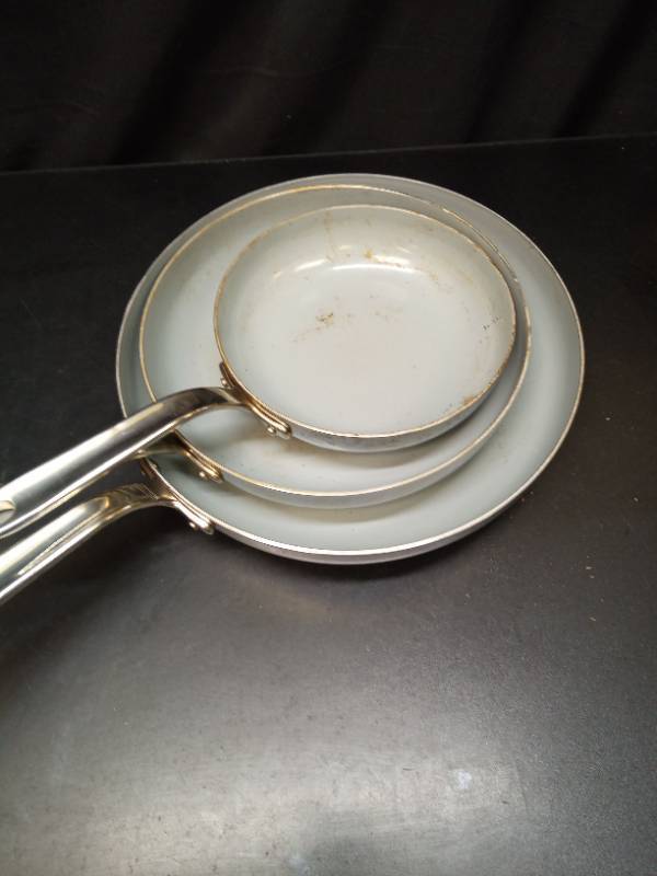 lot 1036 image: Tramontina Tri-Ply Clad Cookware Set 3-Piece Frying Pans 8.1 in - Retail $53