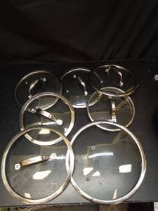lot 1100 image: Glass Cookware Lids Set 7-Piece with Metal Handles - Retail $65