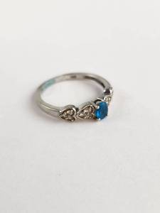 lot 121 image: Sterling Silver Ring with Blue Stone and Decorative Heart Accents