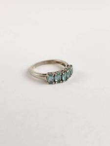 lot 125 image: Sterling Silver Ring with Five Blue-Green Stone Settings