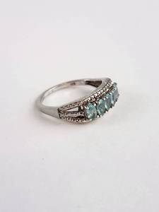 lot 129 image: Silver Ring with Blue-Green Stones and Beaded Detail