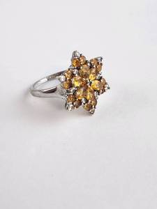 lot 132 image: Sterling Silver Ring with Citrine and Clear Stone Cluster