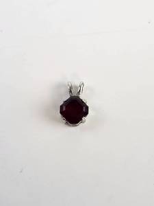 lot 163 image: Dark Red Gemstone Pendant with .925 Setting