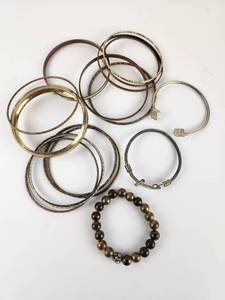 lot 225 image: Lot of Brass Bangle Bracelets with Beaded Bracelet