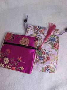 lot 1104 image: Embroidered Fabric Pouches with Drawstring 2-Piece Set Purple Pink