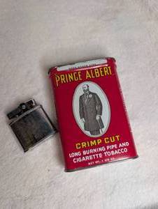 lot 1500 image: Prince Albert Tobacco Tin Container  Lighter