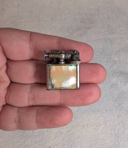 lot 1503 image: Miniature Lighter with Mother of Pearl Front Panel&nbsp