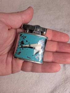 lot 1504 image: Omega Lighter with Turquoise Enamel Inlay