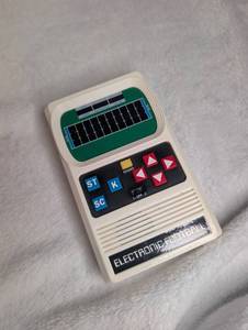 lot 2517 image: Vintage Electronic Football Handheld Game