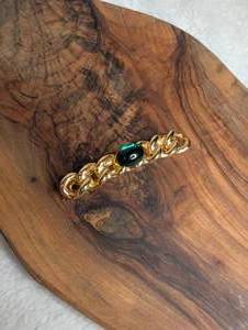 lot 3303 image: Gold Tone Chain Link Barette with Green Oval Stone