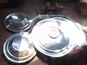 lot 3752 image: Hubcaps, gas nozzle and vise