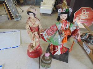 lot 3796 image: Asian dolls and brass box