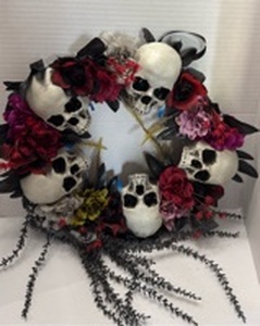 lot 10378 image: Skull Wreath with Flowers and Black Ribbon 18 inch