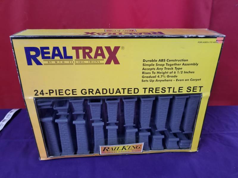 lot 2406 image: Real Trax Rail King 24Pc Graduated Trestle Set