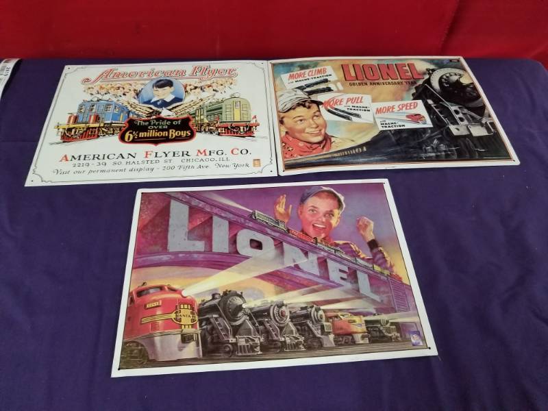 lot 2407 image: Three Metal Lionel  American Flyer Train Signs