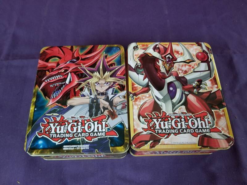lot 2379 image: Two Tins full of YuGiOh Cards