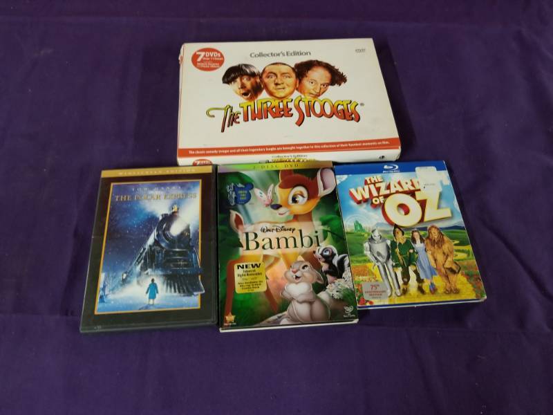 lot 2436 image: Three Stooges DVD Collection, Bambi, Wizard of OZ and Polar Express