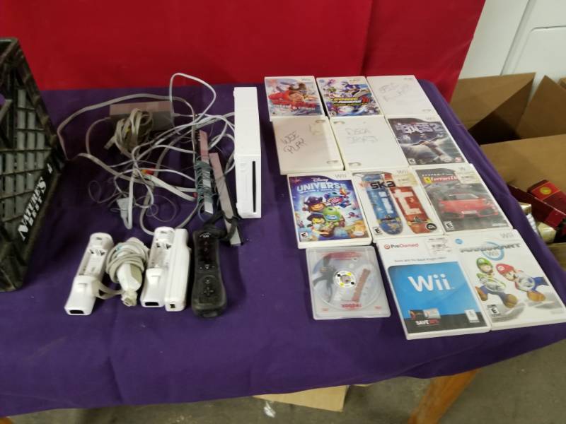 lot 2459 image: Wii System, Twelve Games and Accessories