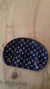 lot 193 image: Brown Oval Cosmetic Bag with Eiffel Tower Floral Pattern