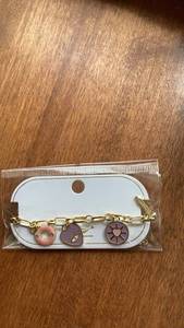 lot 200 image: Gold Chain Bracelet with Pink and Purple Charm Pendants