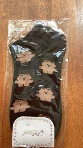 lot 202 image: Socks with bear Face Pattern Black Tan One Pair