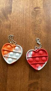 lot 208 image: Heart-Shaped Pop It Fidget Toy Keychain 2-Pack