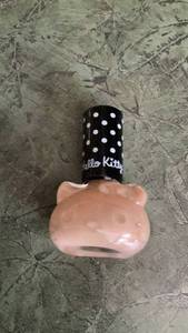 lot 230 image: Hello Kitty Nail Polish Black with White Polka Dots pink shade