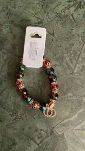 lot 236 image: Beaded Bracelet with Red and Teal Faceted Beads