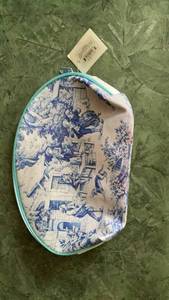 lot 247 image: Oval Decorative cosmetic bag Blue and White Print Turquoise Trim