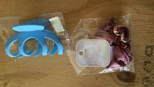 lot 317 image: Blue Spiral Hair Clip with Storage Case and Accessories