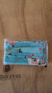 lot 324 image: Disposable Face Masks Floral Print Turquoise