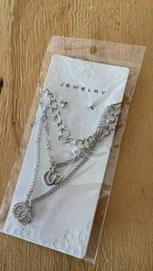 lot 348 image: Multi-Chain Layered Necklace with GG and Moon Pendants with stud earrings