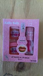 lot 376 image: Kathy Kelly Lip Gloss & Lip Balm 3 in 1 KS90