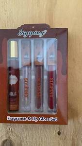 lot 407 image: Sipping Fragrance & Lip Gloss Set 4 Piece