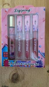 lot 408 image: Sinyining Fragrance & Lip Gloss Set 4-Piece
