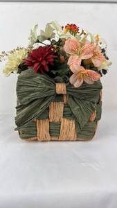 lot 53 image: Dried Flower Arrangement in Woven Basket with Bow