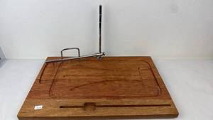 lot 59 image: Wood Carving Board with Metal Skewers and Handles