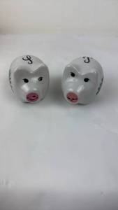 lot 66 image: Pair of Ceramic salt and pepper shakers with Floral Design.